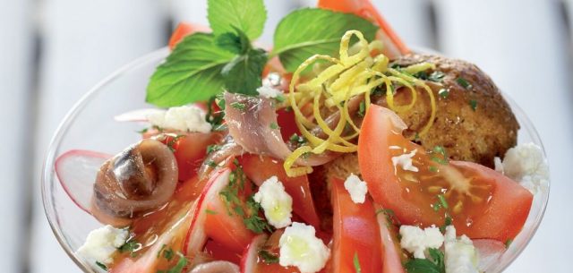 Summer salad with Tomatoes, barley rusks, Feta, Anchovies and Herbs